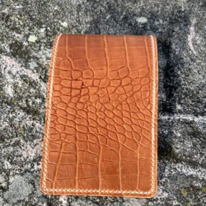 Golf yardage book cover in crocodile embossed genuine leather.