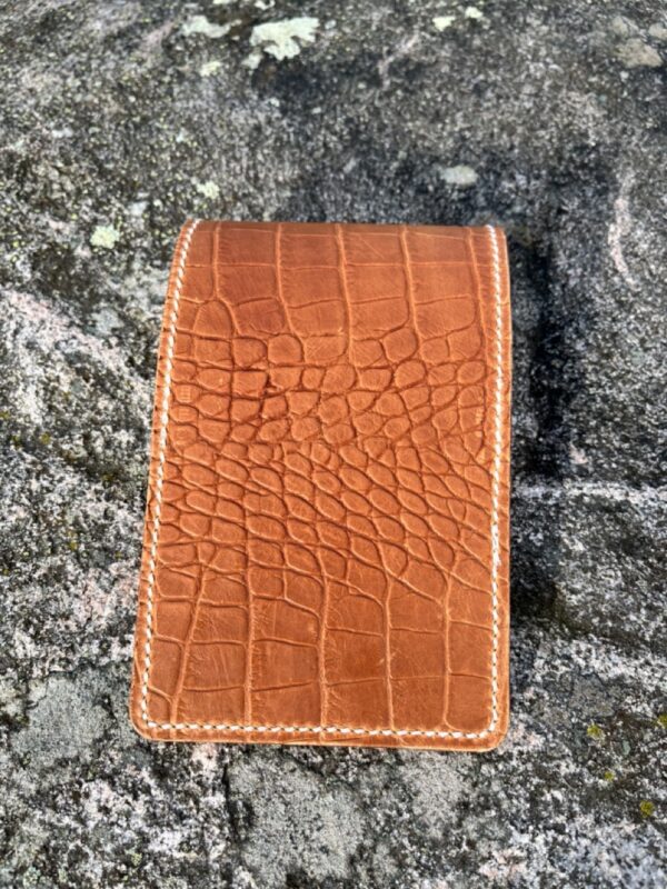 Golf yardage book cover in crocodile embossed genuine leather.