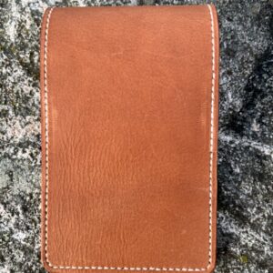 Golf yardage book cover in cognac colored pulled-up genuine leather