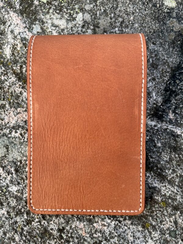 Golf yardage book cover in cognac colored pulled-up genuine leather