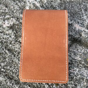 Golf yardage book cover in cognac colored pulled-up genuine leather