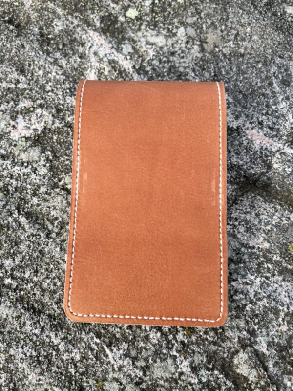 Golf yardage book cover in cognac colored pulled-up genuine leather